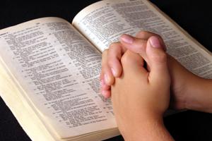Praying-over-bible